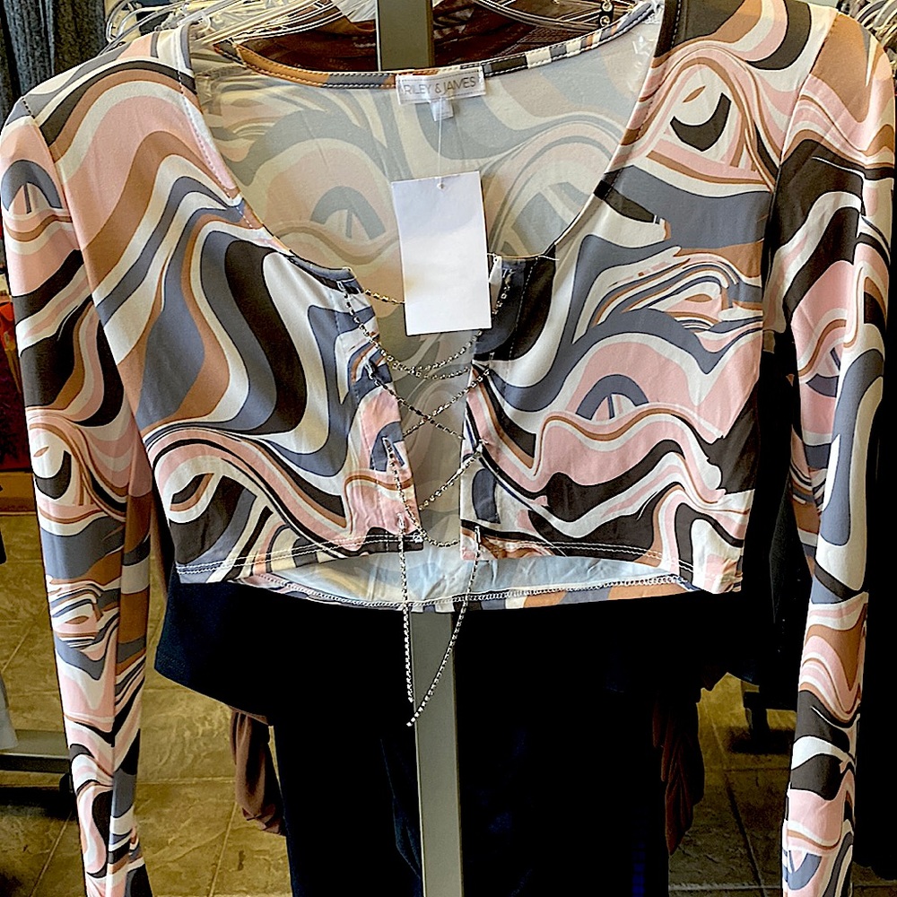 Pink,brown,white and gray swirly shirt